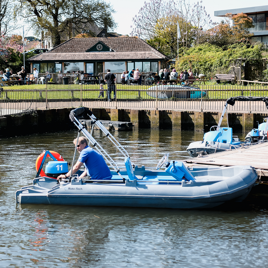 Family enjoying a self-drive boat